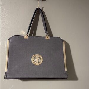 Gold and Gray Satchel with Structured Design and Medallion